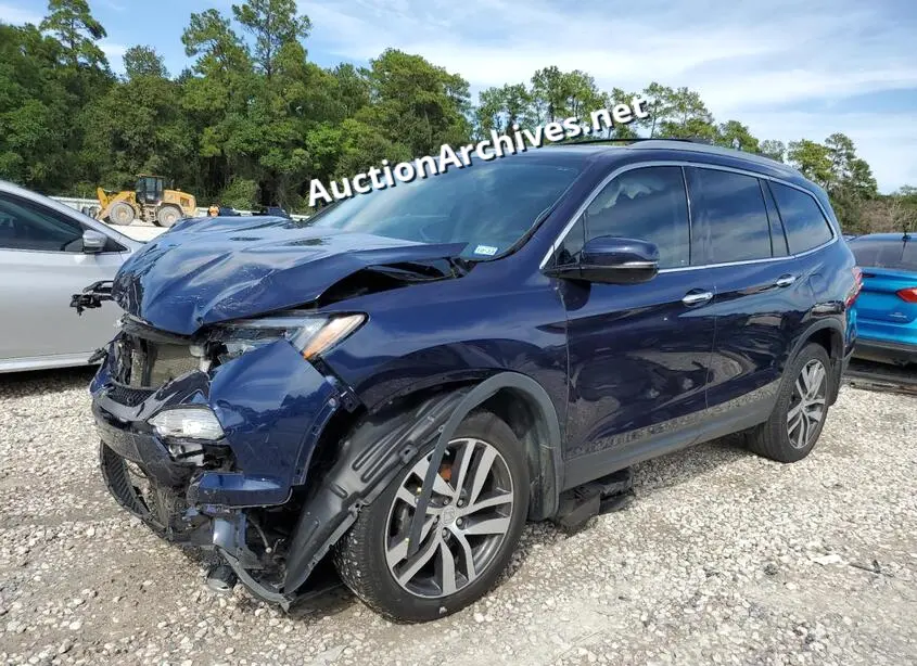HONDA PILOT TOUR 2017 VIN: 5FNYF5H92HB000581